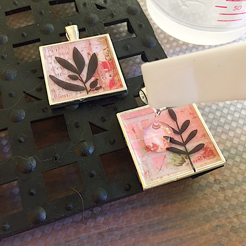 Clear doming epoxy in a jewelry bezel
