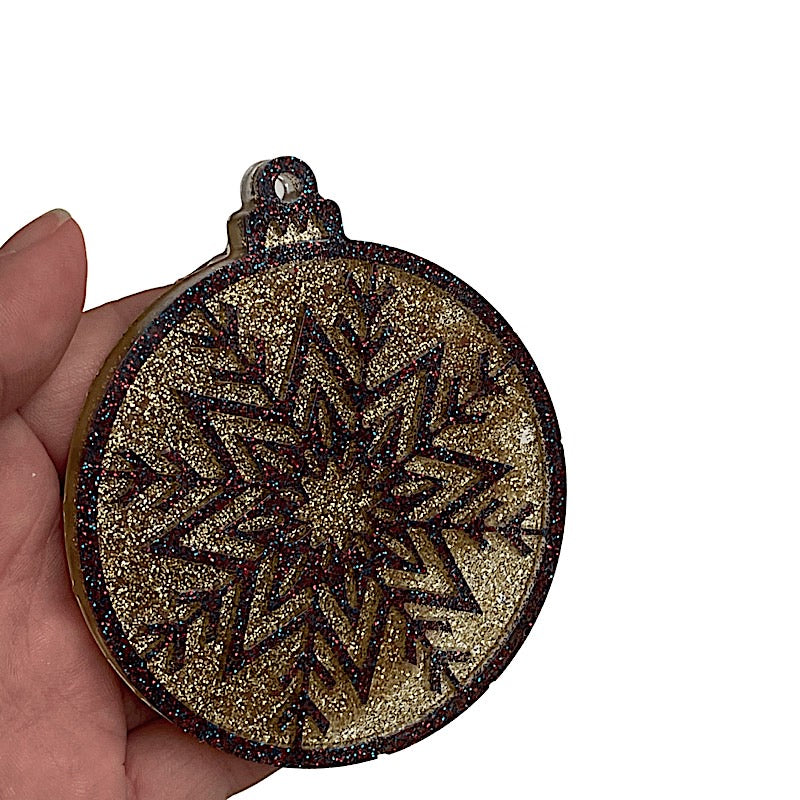 Resin Christmas ornament with glitter
