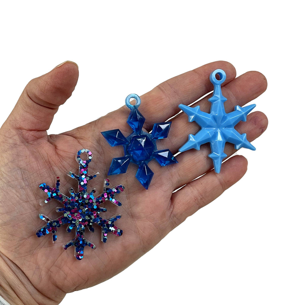 Blue sparkle snowflakes made with resin
