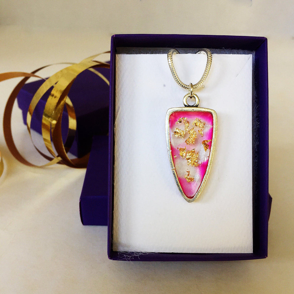 Silver pendant with resin and gold leaf
