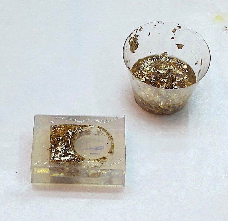 Gold leaf in a resin ring mold