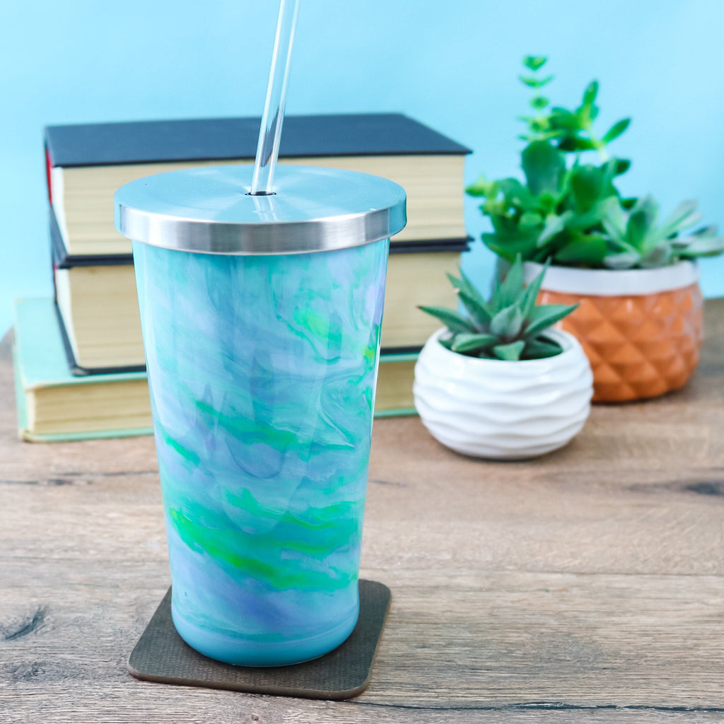 Tumbler covered with resin